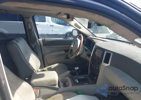 2009 Jeep Grand Cherokee Overland z USA, uszkodzony, nr VIN 1J8HR68T49C549893